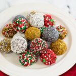 Christmas Brownie Balls on a white tray.