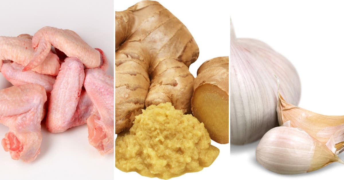 Fresh ginger root with minced ginger, and a whole garlic bulb with cloves rest invitingly on a white background.