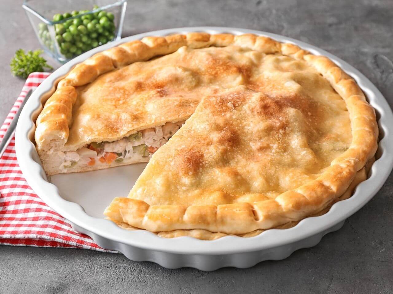 An easy turkey pot pie with a slice out.