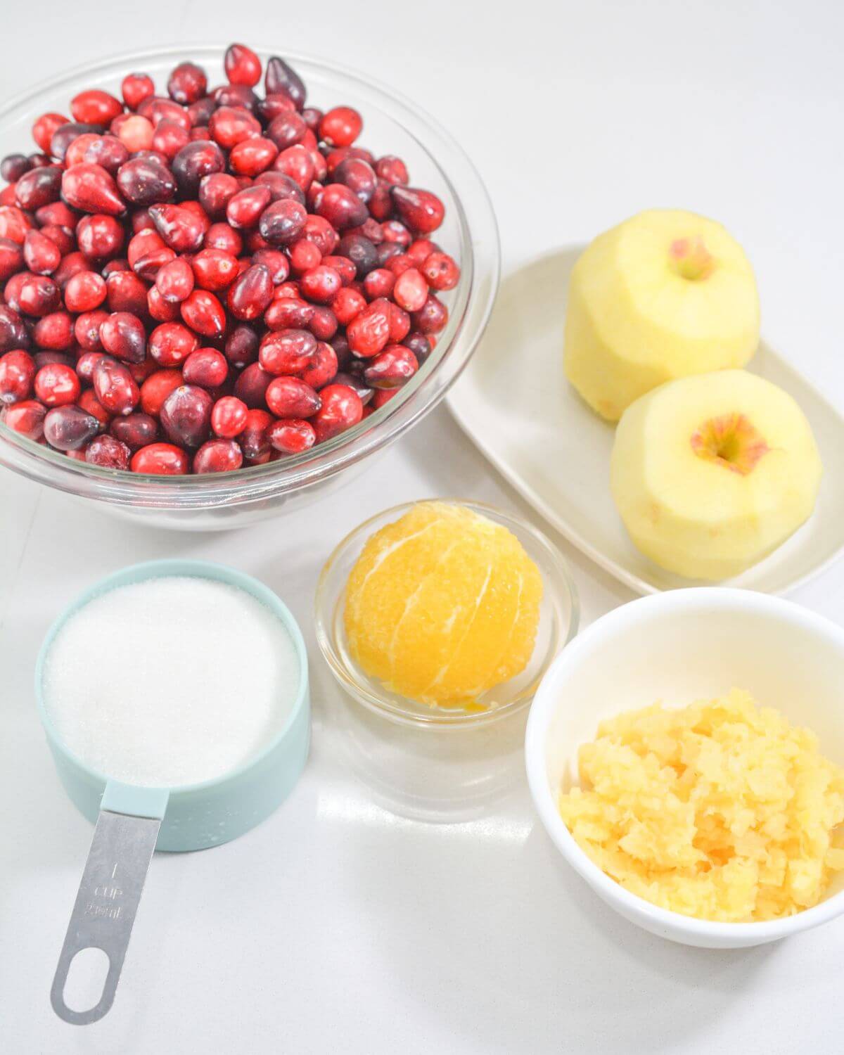 Ingredients for making fresh cranberry sauce with oranges. 
