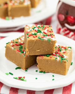 Three squares of gingerbread fudge with sprinkles on top.