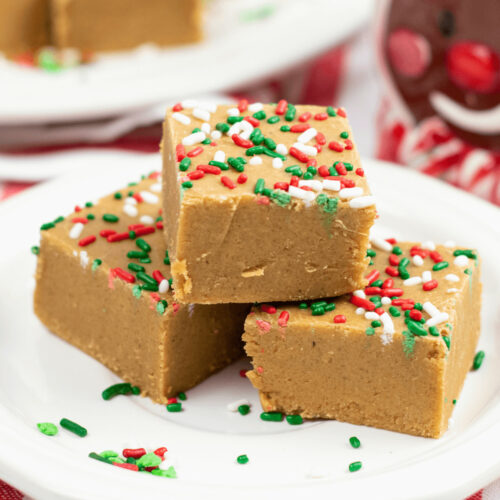 Three squares of gingerbread fudge with sprinkles on top.