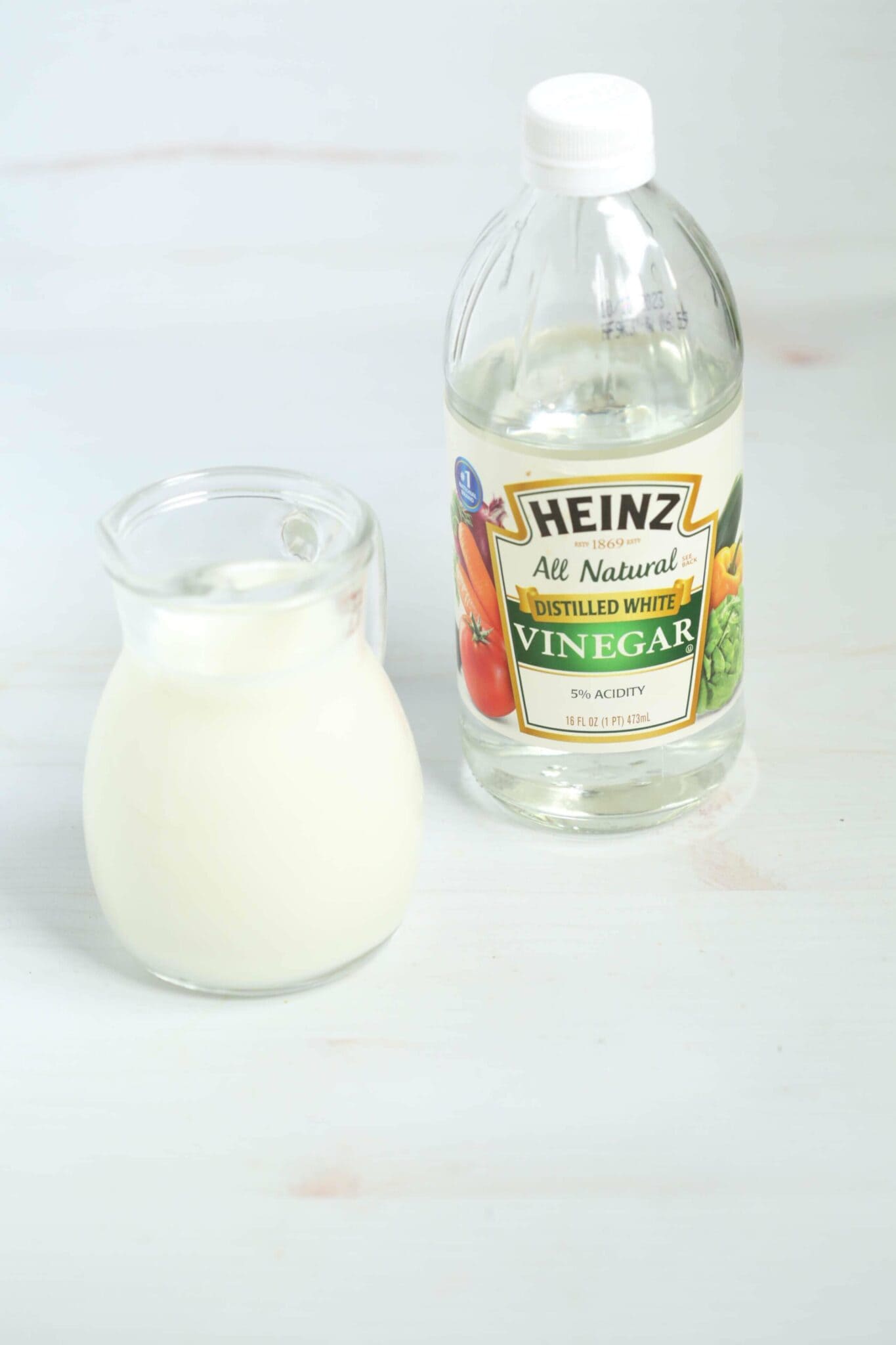 Vinegar and a measuring cup.