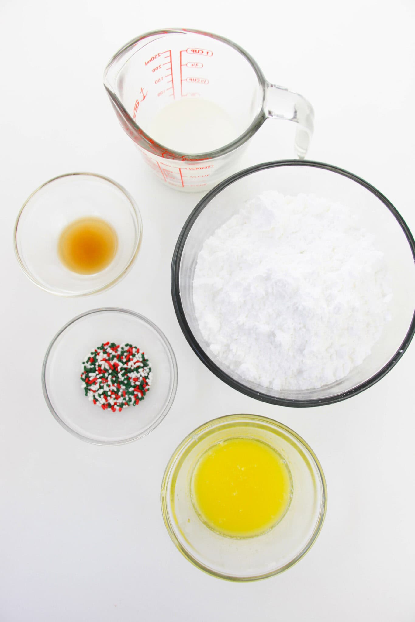 Flour, extract, sugar and eggs for the cookies.