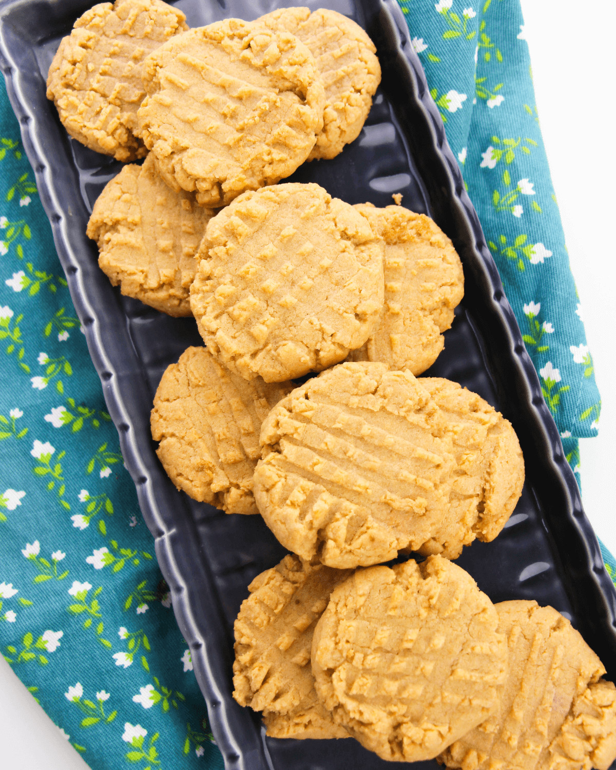 A large tray of the large jif peanut butter cookies.