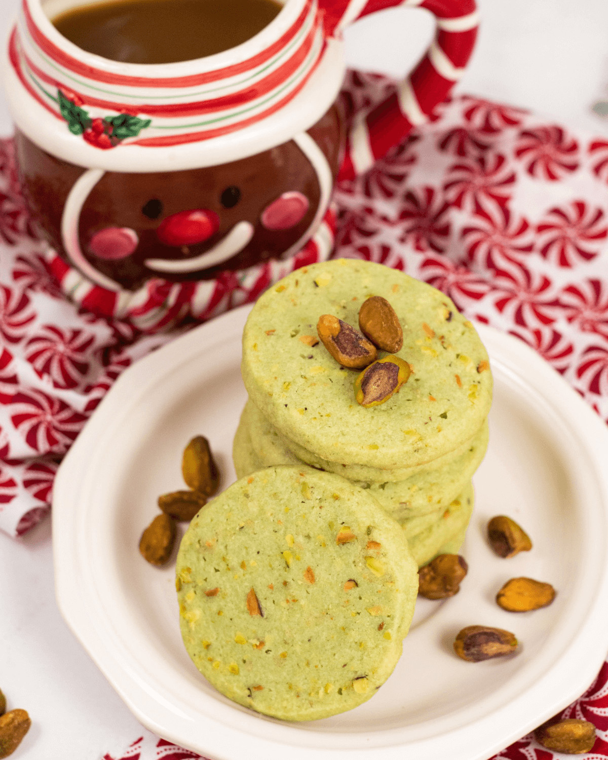 A view of the pistachio cookies and a cup of coffee.