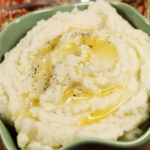 Pressure Cooker Mashed Potatoes in a green bowl.
