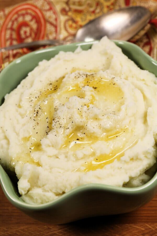  Pressure Cooker Mashed Potatoes  in a green bowl.
