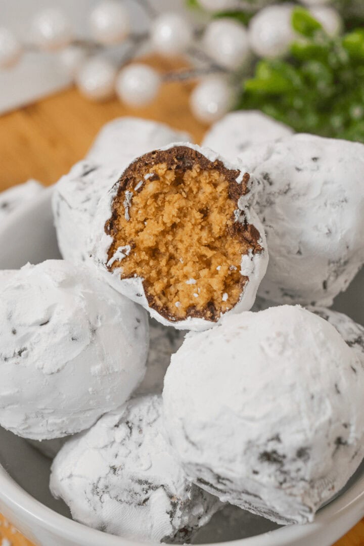 Fun Chex peanut butter truffles in a white bowl.