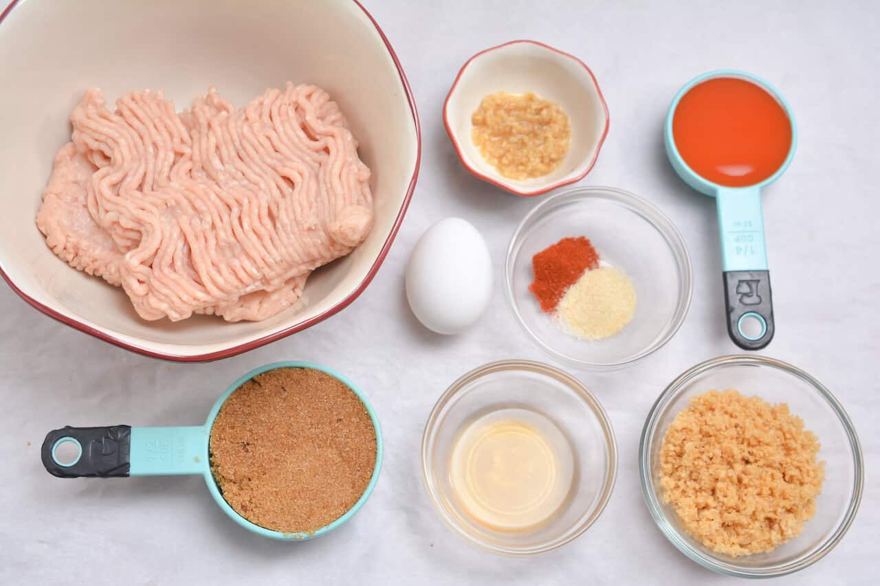 Ground chicken, spices, egg and pork rinds.