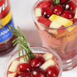 Two of the festive drink in clear glasses.