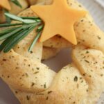 Crescent Roll Wreaths with a sprig of rosemary.