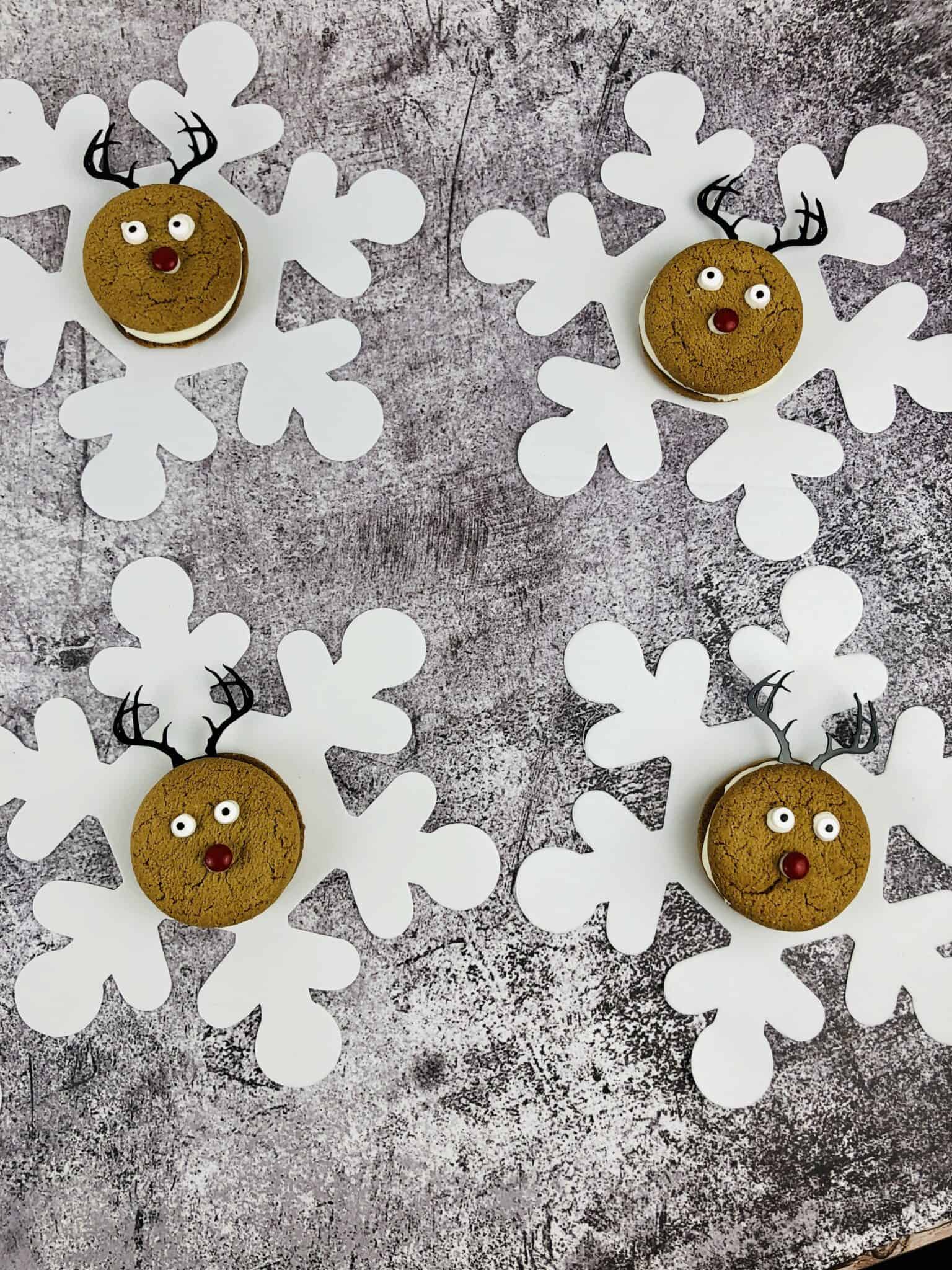 A group of the finished cookies on snow flakes.