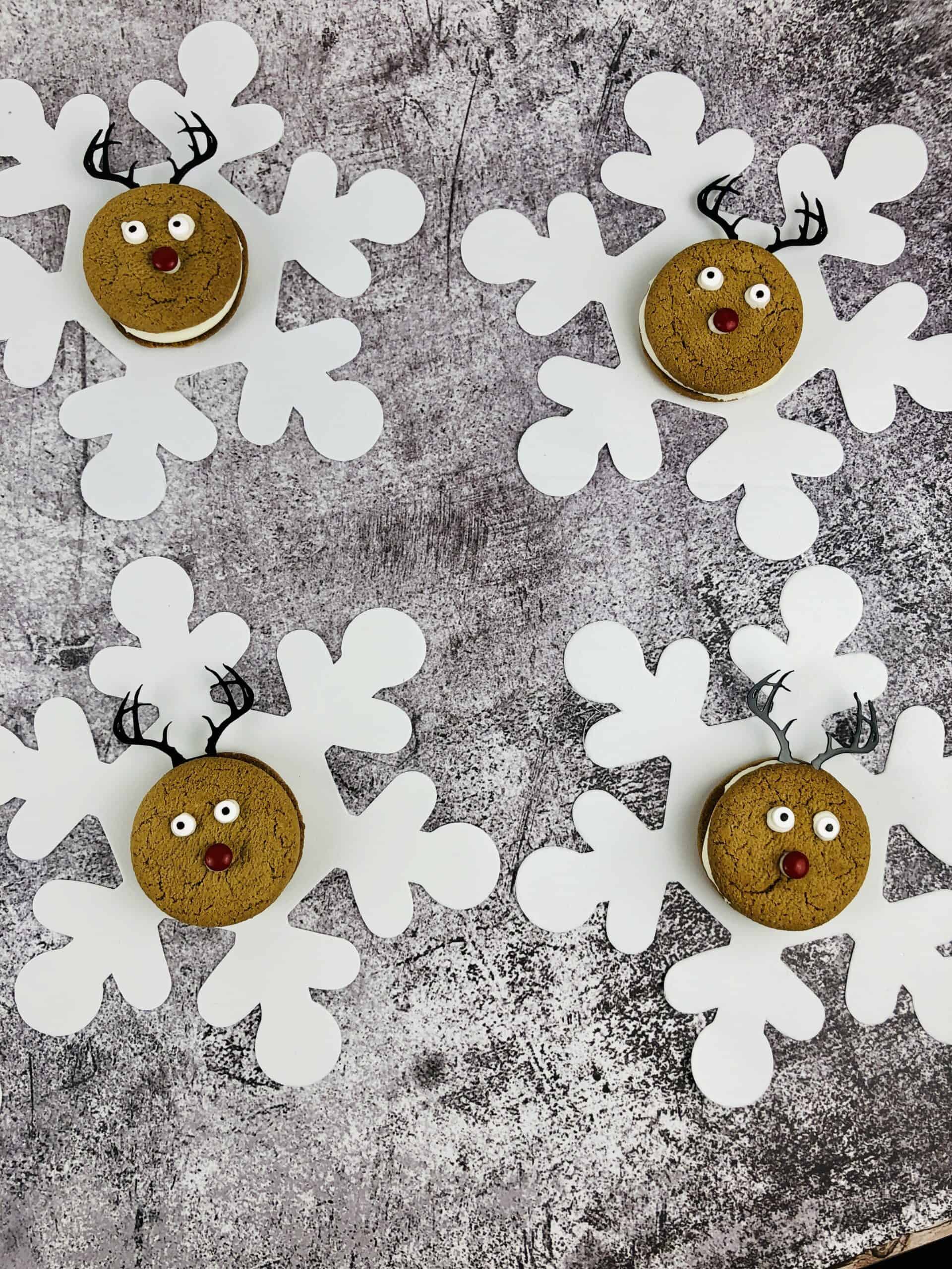 A group of the finished cookies on snow flakes.