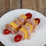 A white plate with the snack on it.