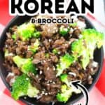 A black bowl filled with Korean Beef and Broccoli—tender ground beef, vibrant broccoli florets, and fluffy white rice—garnished with sesame seeds, sits on a red and white checkered cloth. Text labels read “Ground Beef Korean & Broccoli Easy.”.