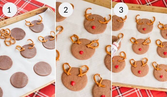Laying out the cookies on parchment and decorating the Pretzel Reindeer Cookies.