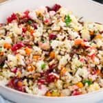A white bowl filled with easy wild rice pilaf.