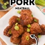 A plate of Asian Pork Meatballs garnished with chopped green onions, with a bowl of soy sauce and fresh green onions in the background. Text overlay reads “Asian Pork Meatball Easy.”.