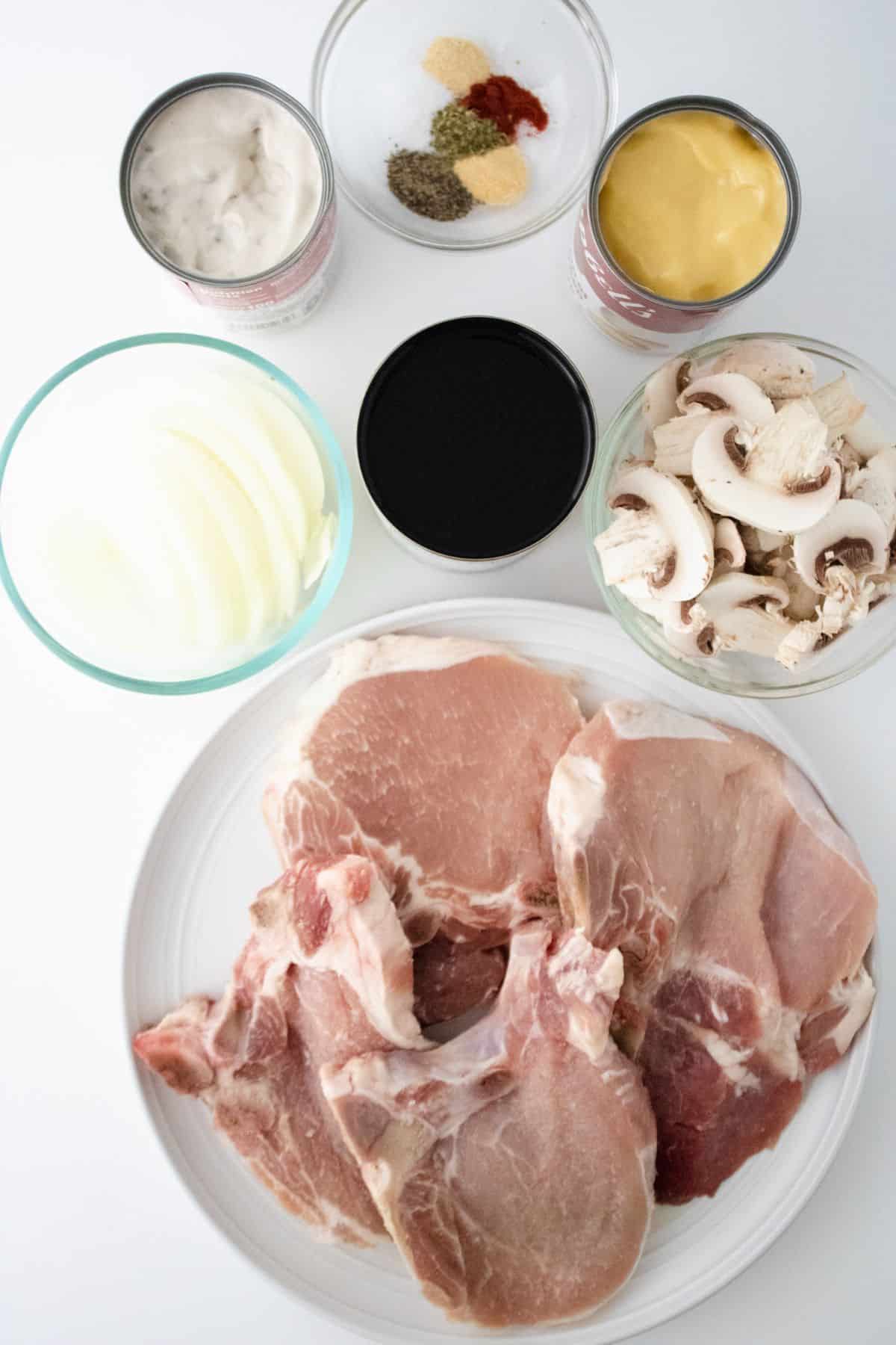 Raw meat, vegetables and the items for the cream sauce.