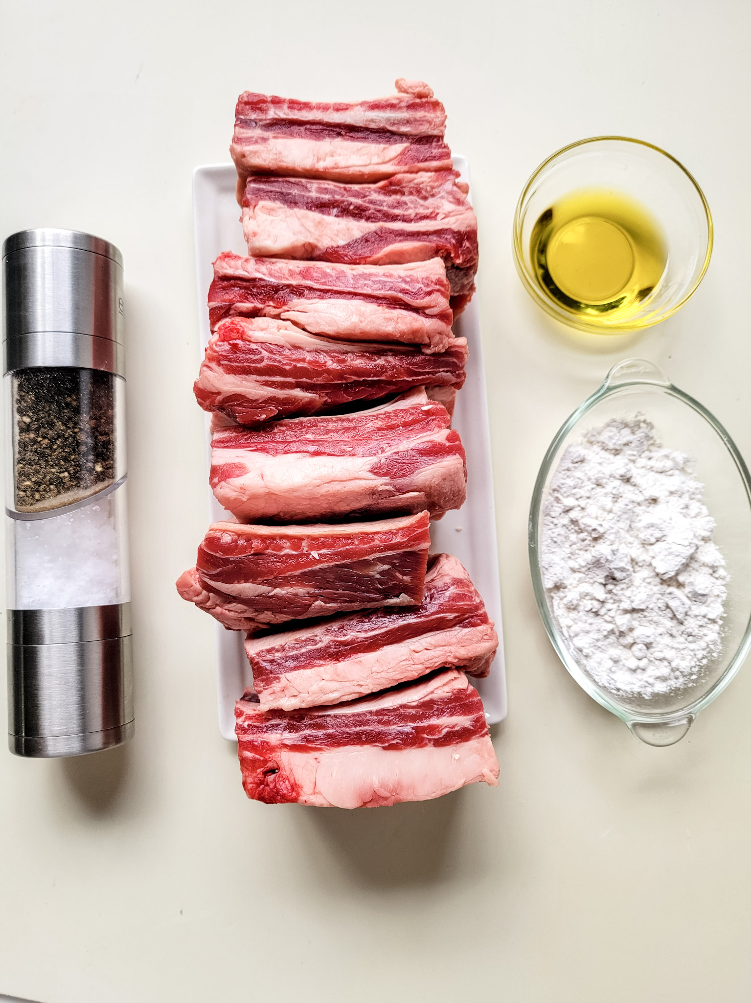 Short ribs and seasonings need to cook in the instant pot.