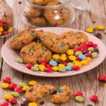 M&M Chocolate Chip Cookies surrounded by candies.