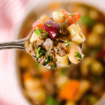 A spoonful of the Italian dish on a stripped placemat.