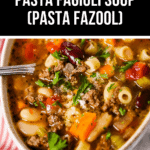 A bowl of Olive Garden Pasta Fagioli Soup with mixed vegetables, beans, ground meat, and pasta, garnished with parsley.