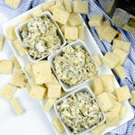 Top shot of the spinach artichoke dip with chips.