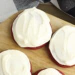 Four are arranged on a wooden surface, partially covered by a black and white checkered cloth.