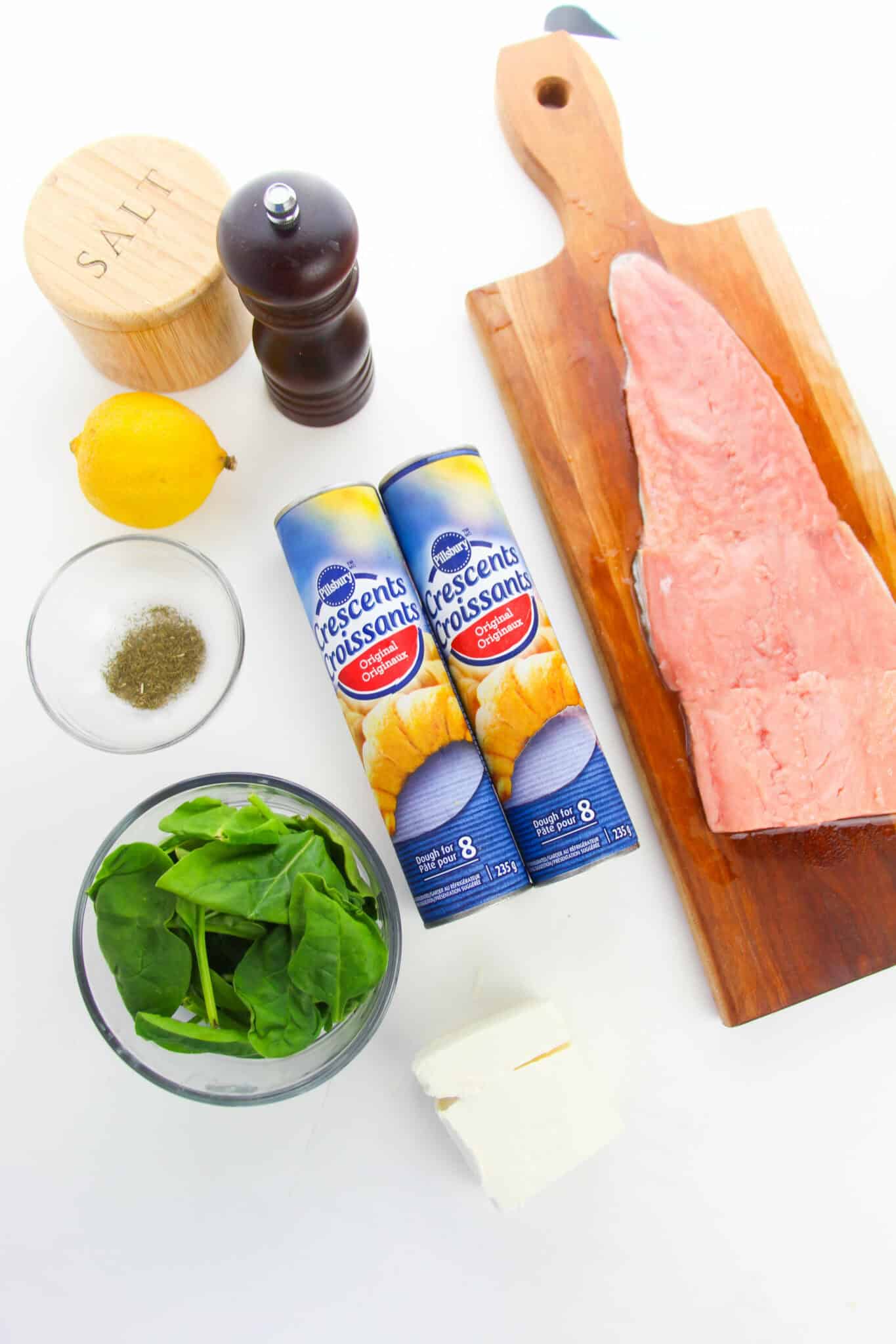 A salmon fillet, the cream cheese and pastry for the dish.