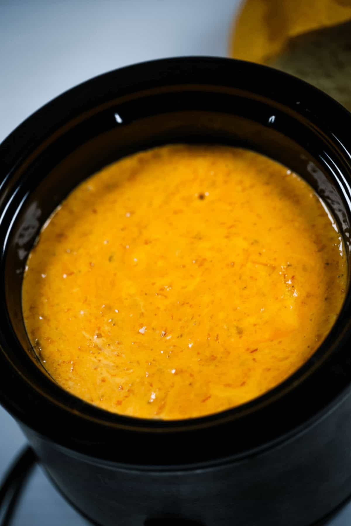 The appetizer with a bread loaf partially visible in the background.