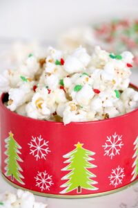 White Chocolate Popcorn in a festive tin.