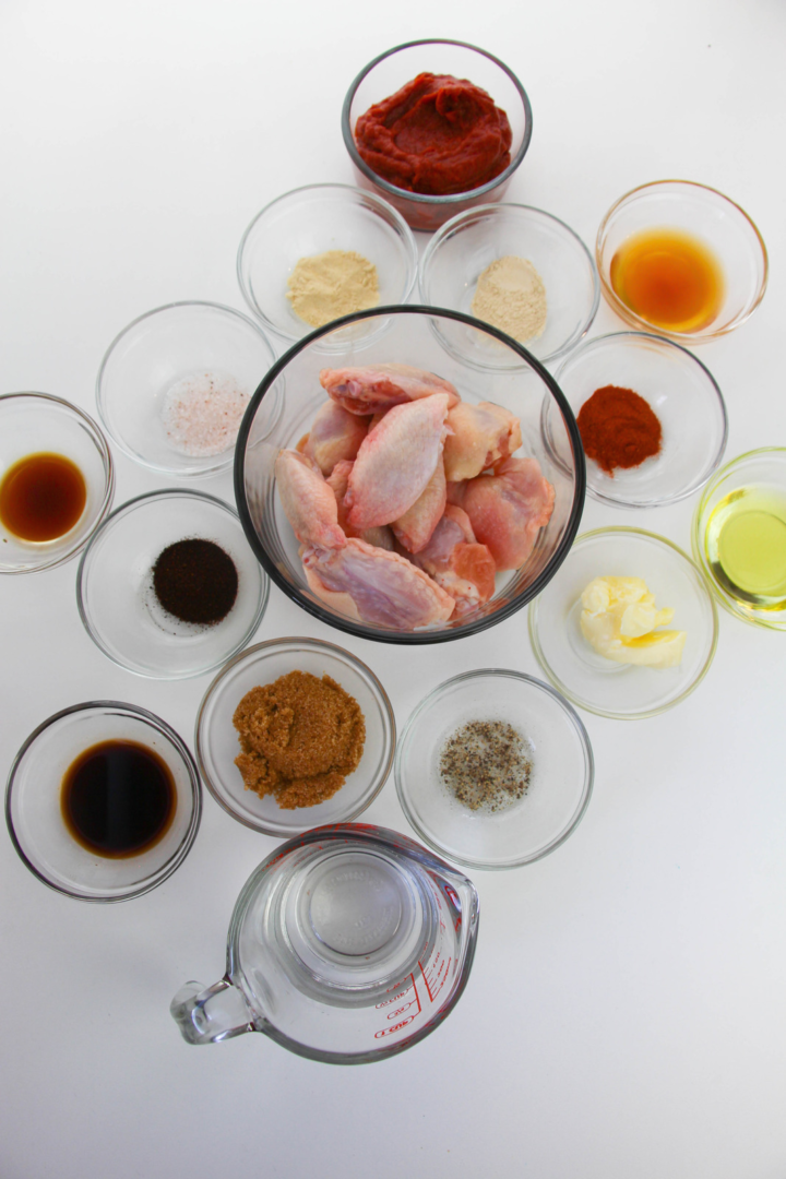 Wings and ingredients to make sauce.