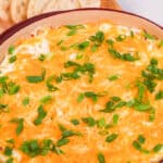 A pot of the appetizer with green onions.