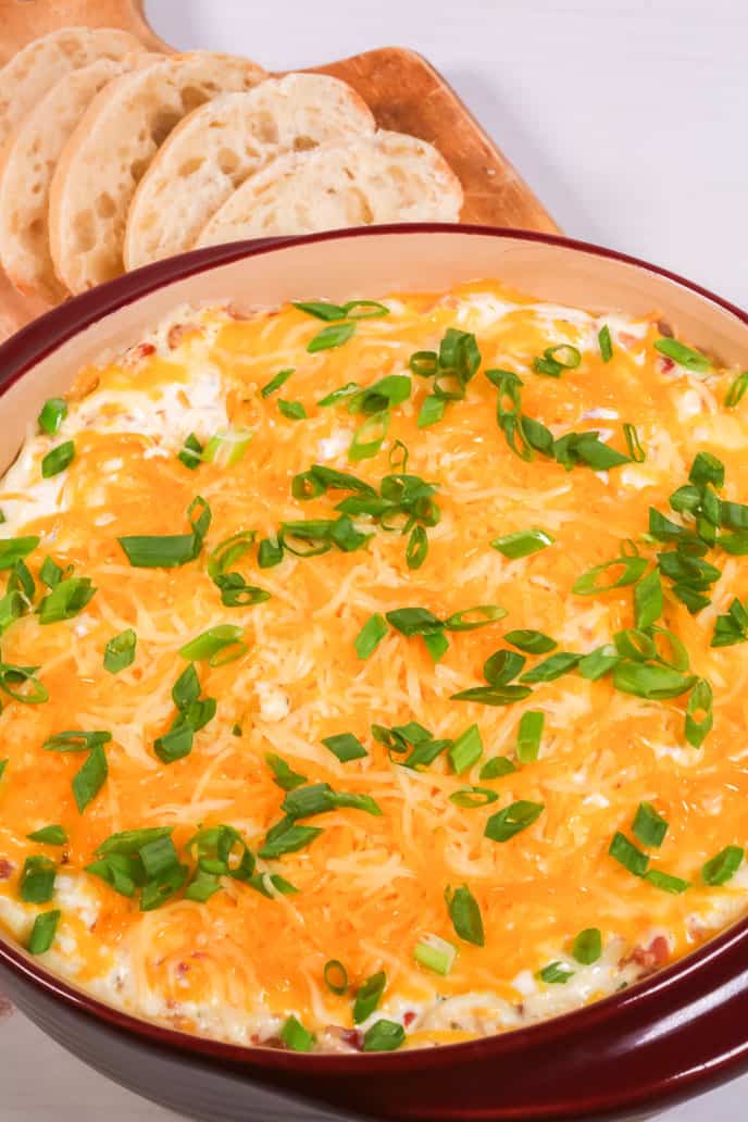 A pot of the appetizer with green onions.