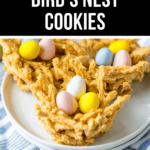 Homemade bird’s nest cookies with candy eggs on a plate.