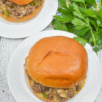 A top shot of two cheesesteak sloppy joes.