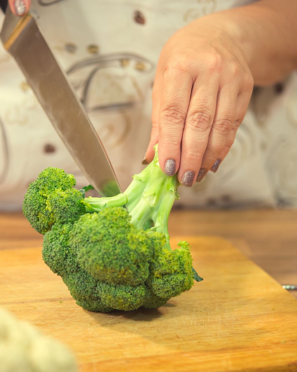 Cutting the broccoli.