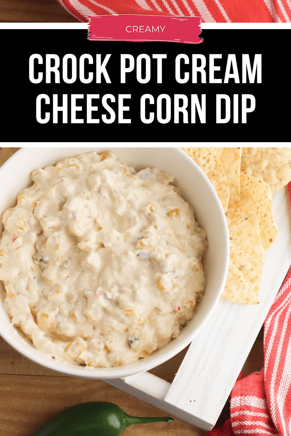 A bowl of rich and creamy crock pot cream cheese corn dip, served alongside crunchy tortilla chips.