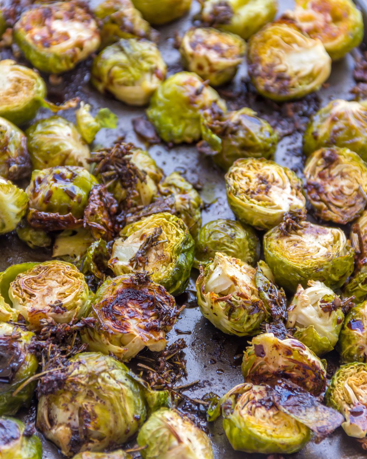 Cooked sprouts on a baking tray.