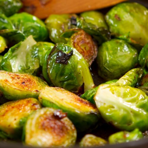 Cooked halved brussels sprouts.