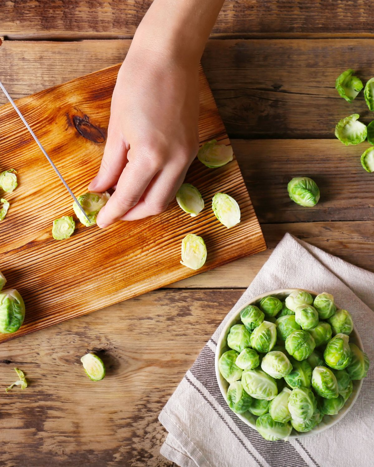 Trimming the brussels sprouts.