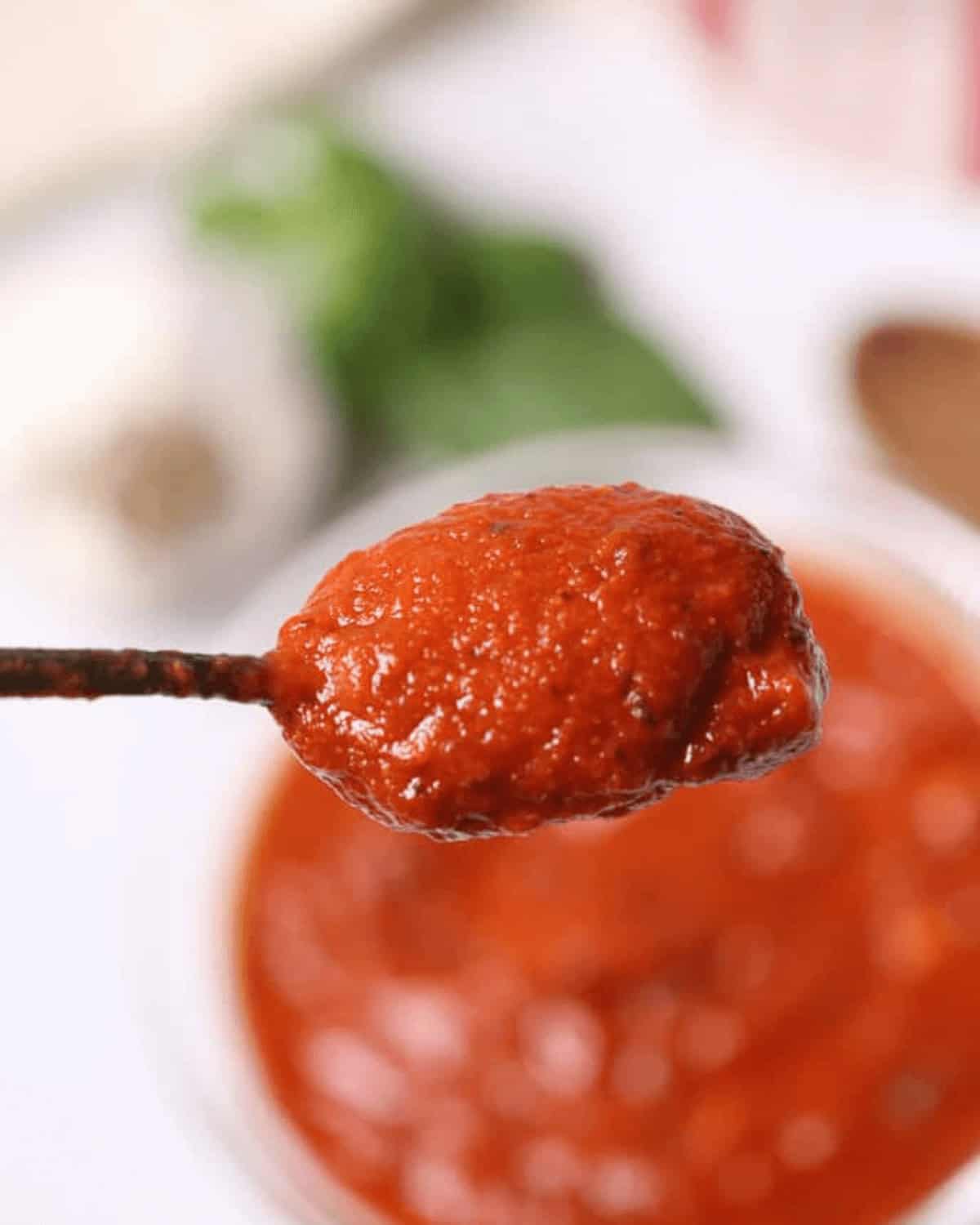 A spoonful over a bowl.