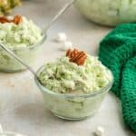 A clear dish of the dessert with a spoon in it.