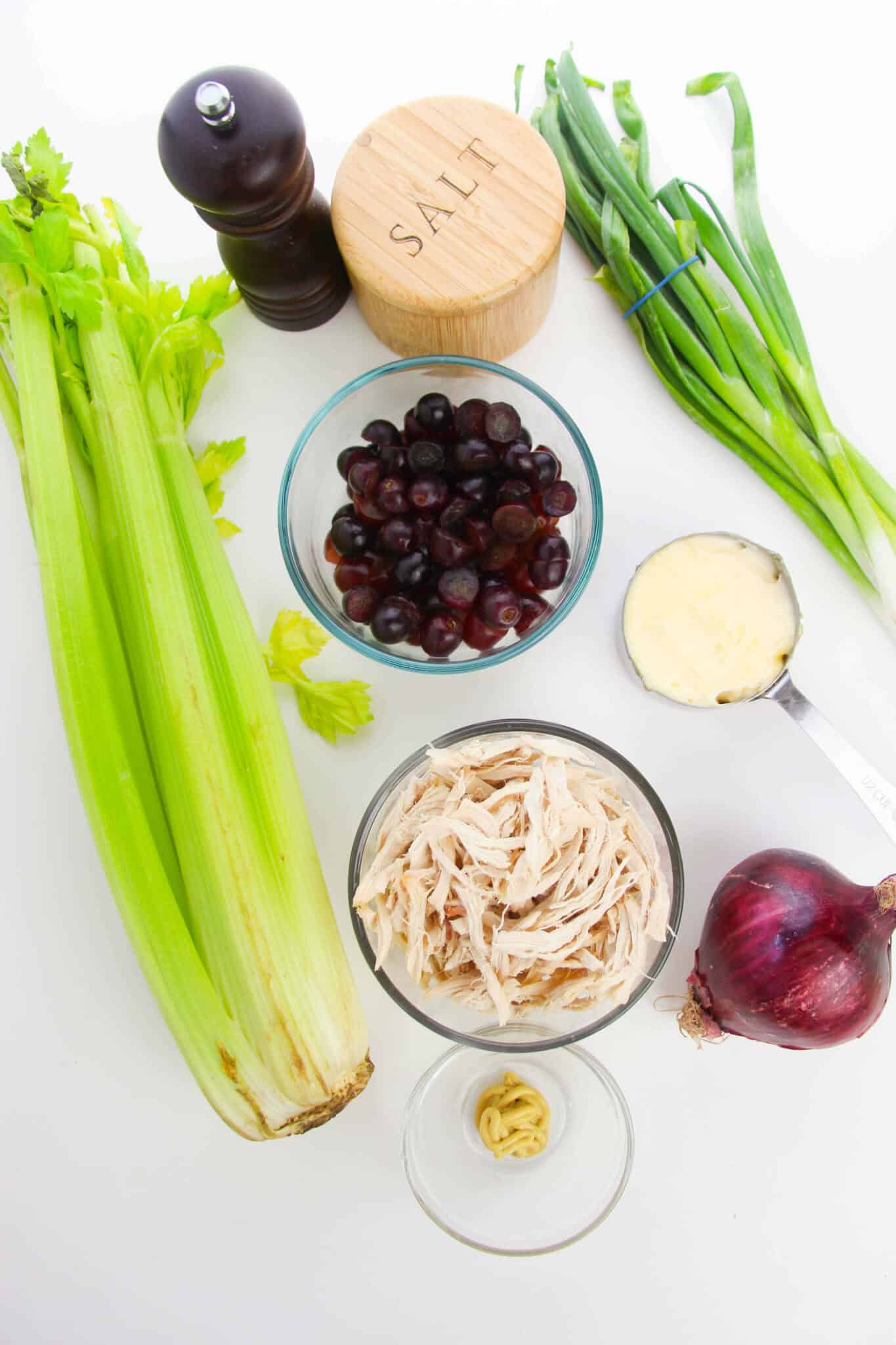 Celery, onions, meat, grapes and nuts for the salad.