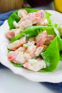 A lettuce cup filled with the crab meat salad.