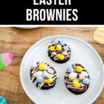 Decorated Easter brownies on a white plate with a festive background.