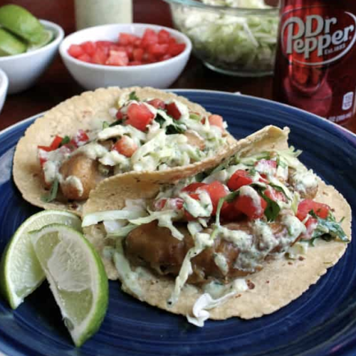 Delicious Dr. Pepper Battered Fish Tacos with Green Chili Crema