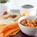 A view of air fryer crispy breakfast potatoes with an orange napkin